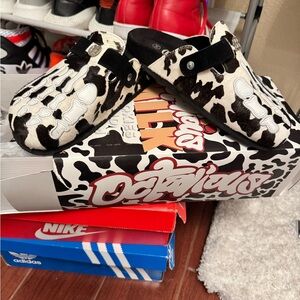 Crocs Cow Pattern Slip-Ons